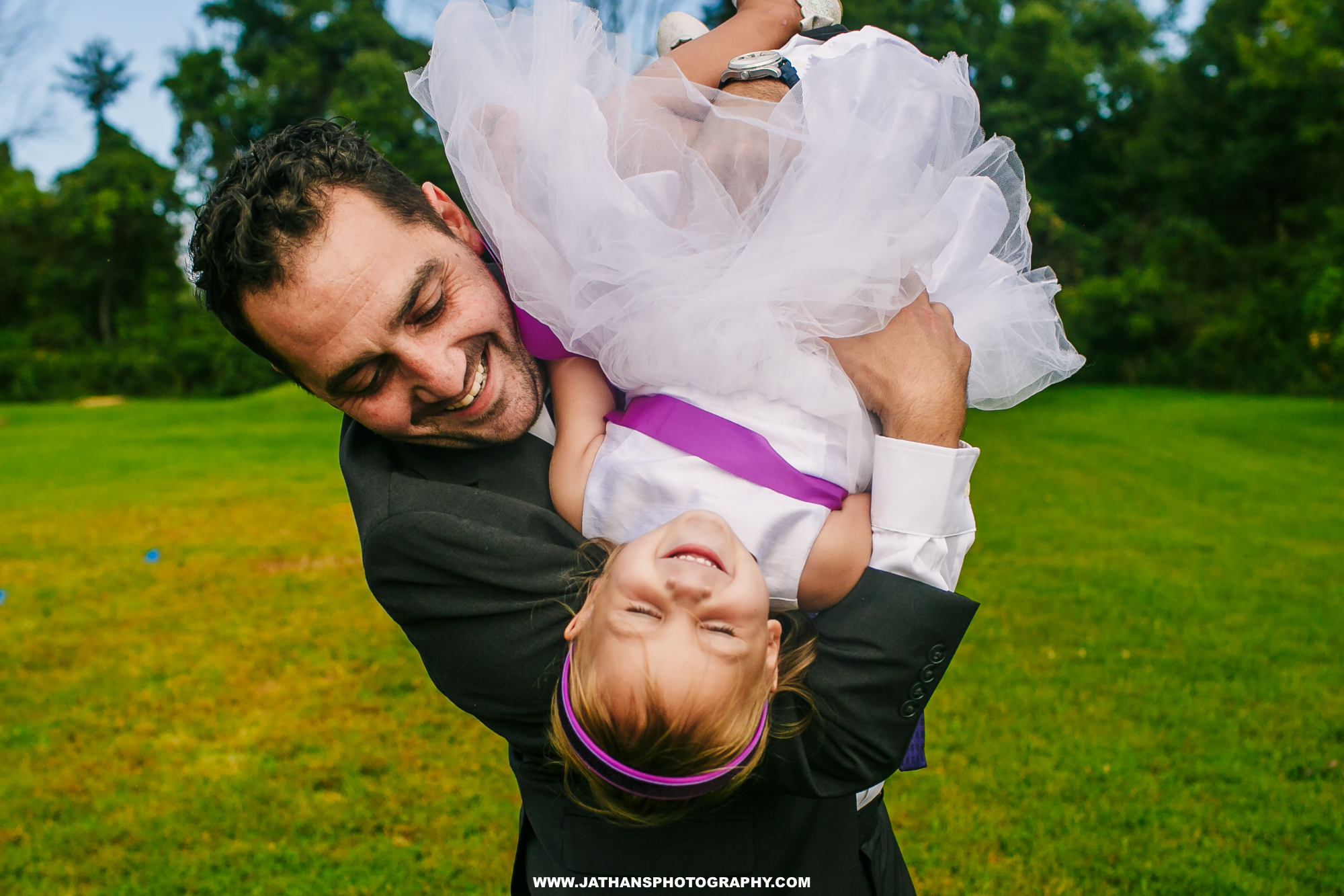 Sweet moment with flower girl Pennsylvania wedding photographer